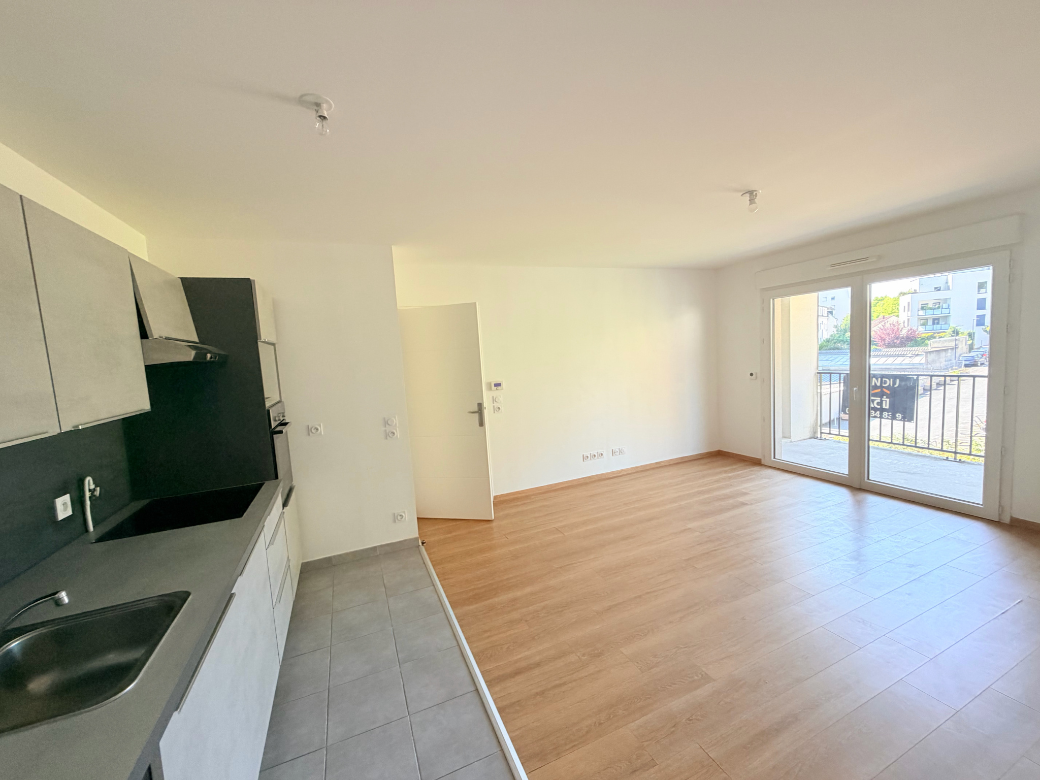 photo_c5a5affc03345b4060ed1b2c6986ee14-786427-0.jpg CAEN VAUCELLES APPARTEMENT 3 PIECES RESIDENCE RECENTE BALCON PARKING